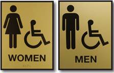 Signs for accessible men's and women's restrooms.
